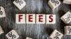 The word fees spelled out on cubes